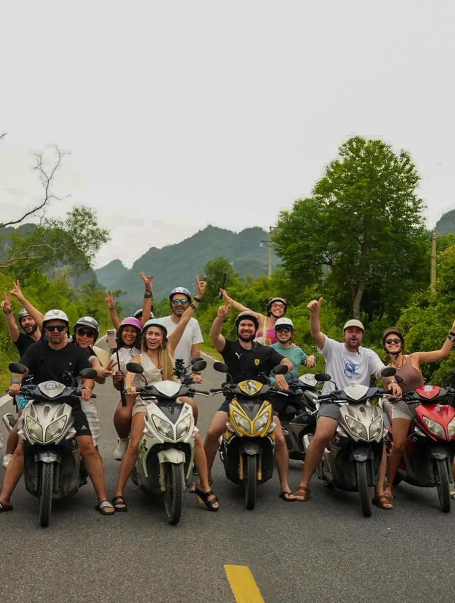 Crew on scooters in Vietnam